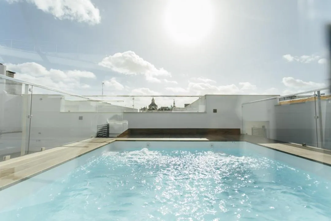 Image 2 of Modern with seasonal swimming pool- 1Bd 1Bth- Goyeneta